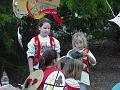 Stephanie Williams and Kara Boldt narrate during cooking contest skit